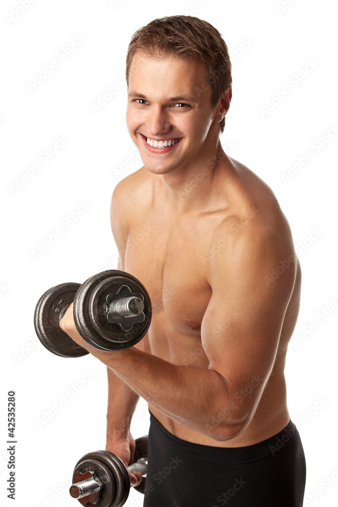 Muscular young man lifting a dumbbell over white Muscular young man lifting a dumbbell over white