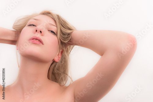 Young woman against white background