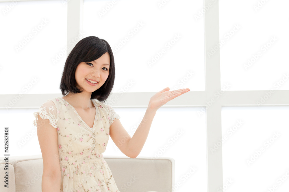 Beautiful young woman relaxing living room. Portrait of asian. Beautiful young woman relaxing living room. Portrait of asian.