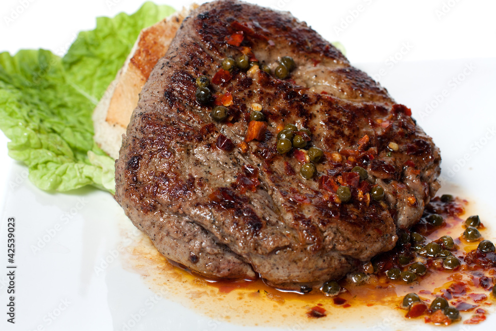 Grilled meat with vegetable sauce Grilled meat with vegetable sauce