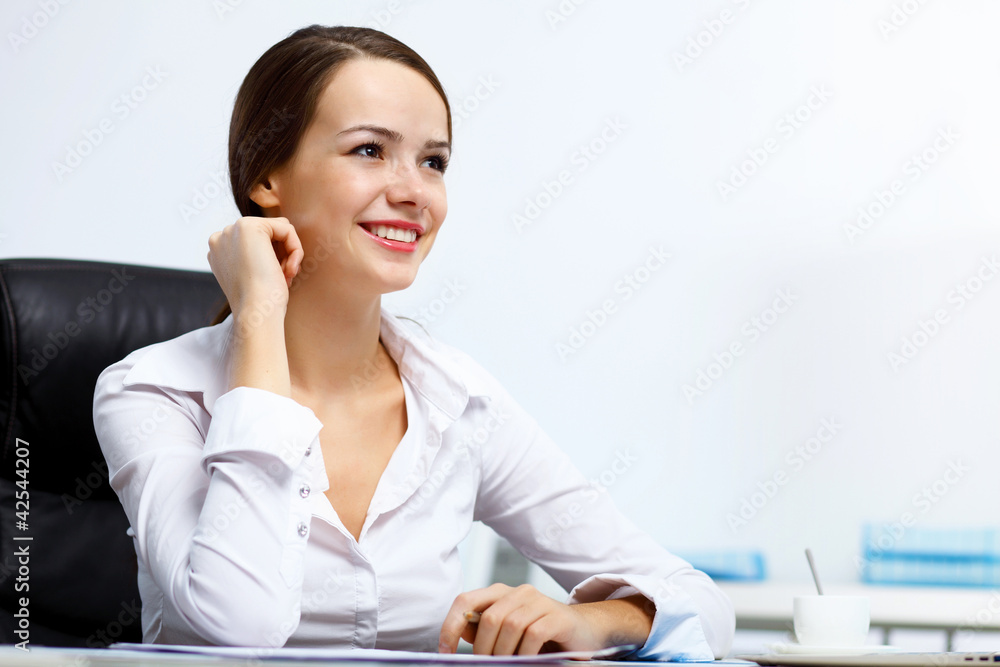 Young businesswoman in the office Young businesswoman in the office