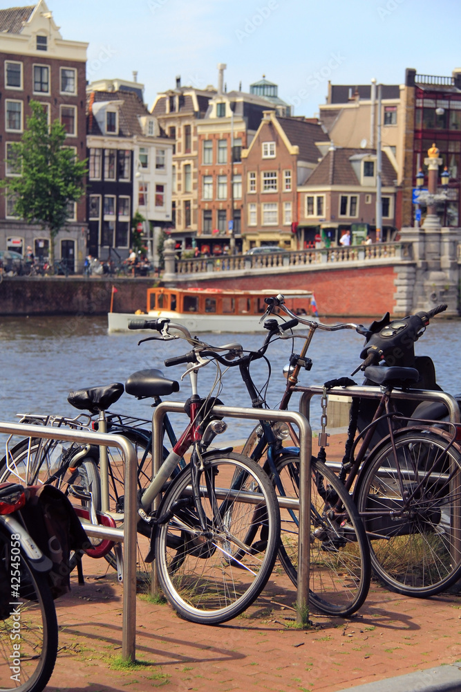 Fototapeta premium Amsterdam canals , bicycle and typical houses , Netherlands