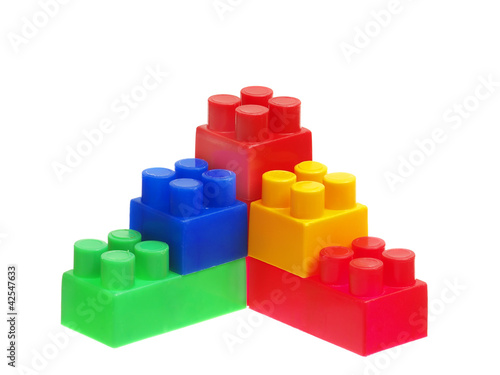 Bright Color Building Blocks Isolated on White. Focus on near ed