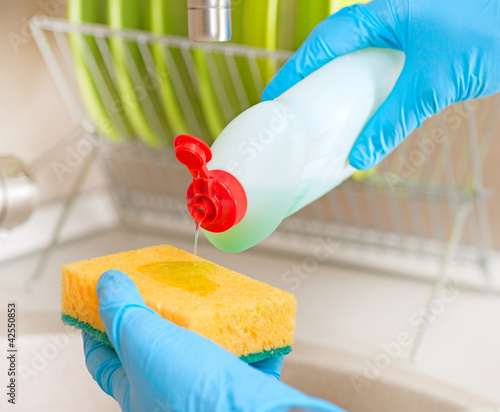 Dishwashing Liquid and Sponge. Dish Washing photo