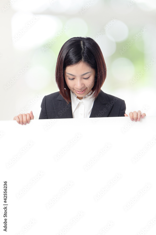Business woman look billboard with copy space Business woman look billboard with copy space