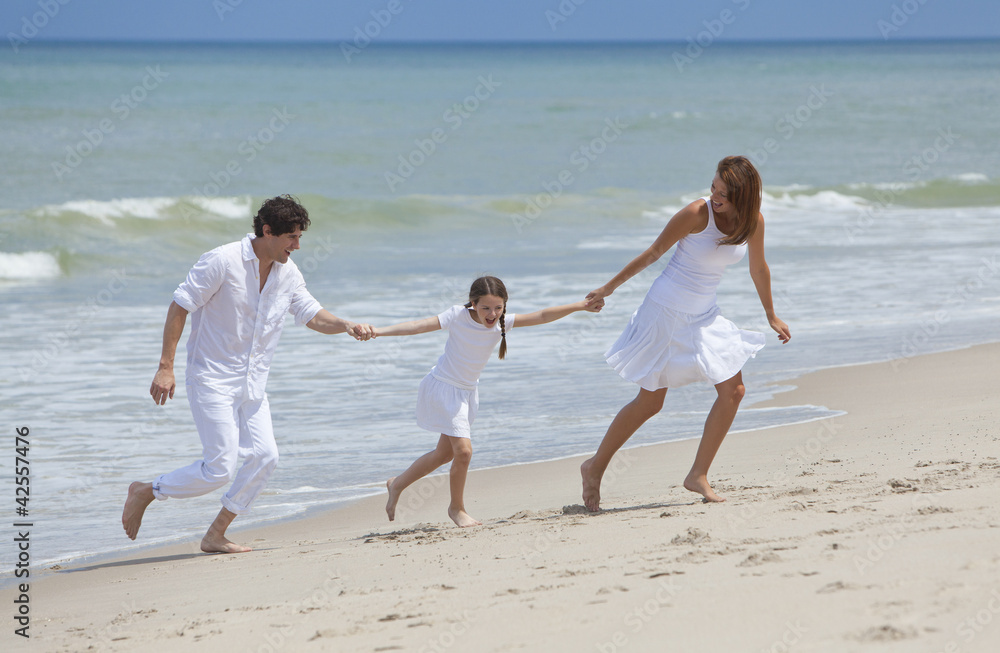 Mother, Father and Child Family Running Having Fun At Beach Mother, Father and Child Family Running Having Fun At Beach