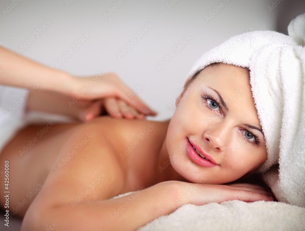 Relaxing massage for young beautiful woman in the spa salon Relaxing massage for young beautiful woman in the spa salon