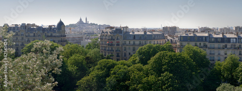 Obraz na plátně Vue de la butte Montmartre depuis les buttes chaumont - Paris