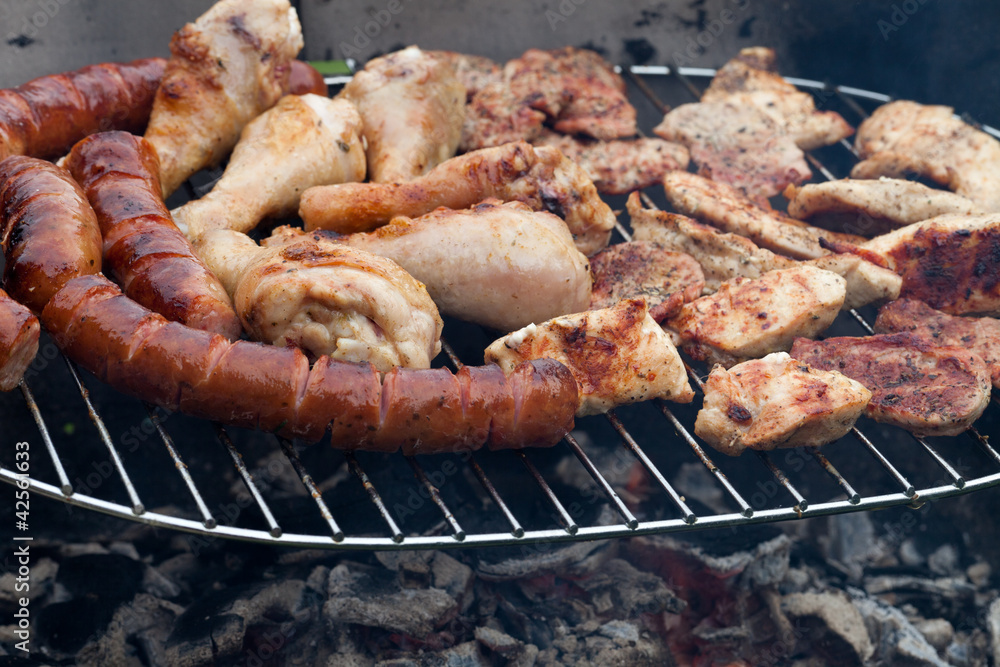barbecue with delicious grilled meat on grill barbecue with delicious grilled meat on grill