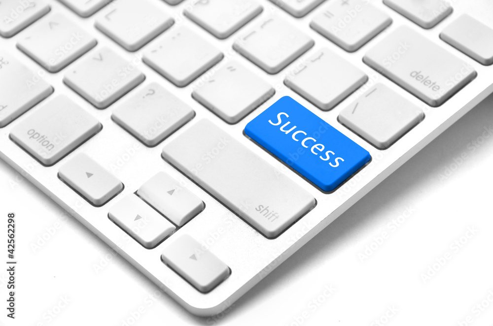 Computer keyboard - blue key Success Computer keyboard - blue key Success