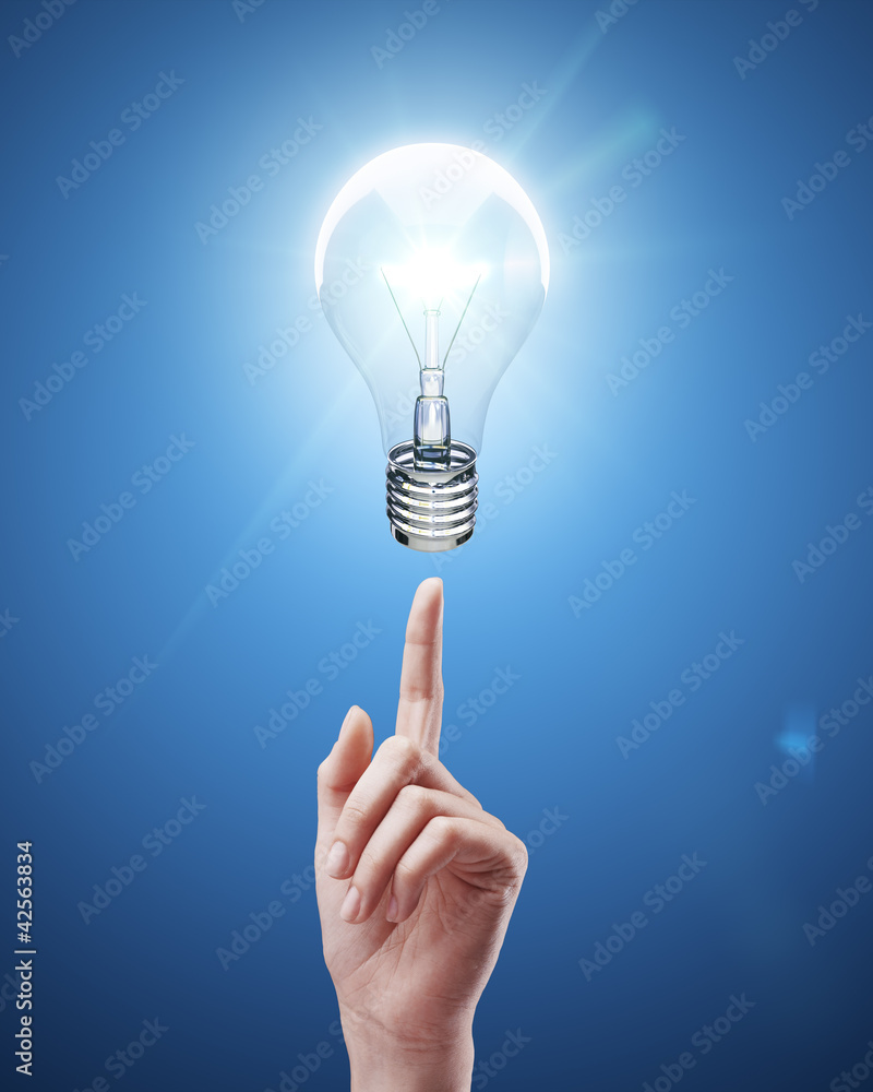 woman's hand and lamp woman's hand and lamp