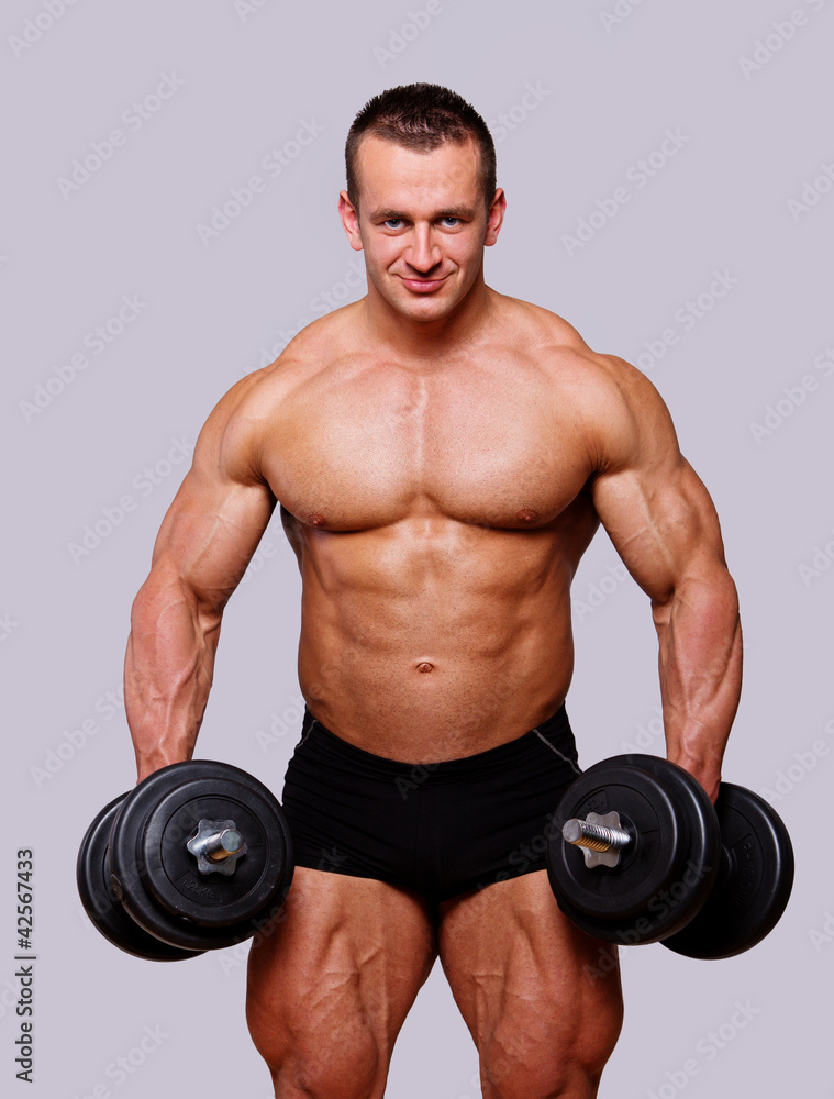 Portrait of man posing in gym