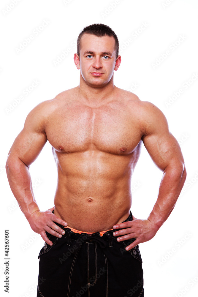 Portrait of strong man in gym