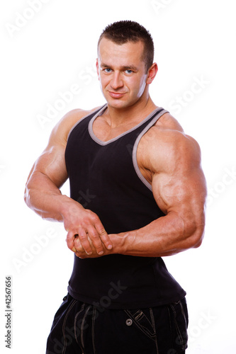 Portrait of man posing in gym