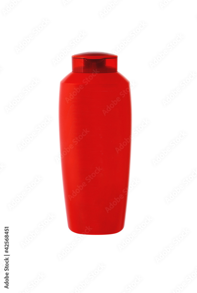 Red shampoo bottle isolated on white Red shampoo bottle isolated on white