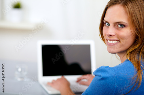 Young woman working on laptop