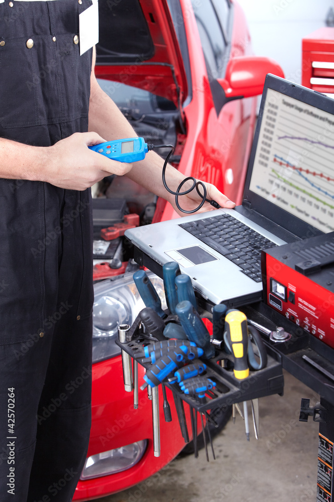 Professional auto mechanic. Professional auto mechanic.