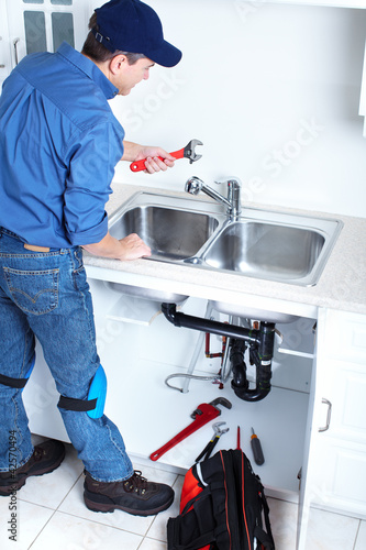Professional plumber.