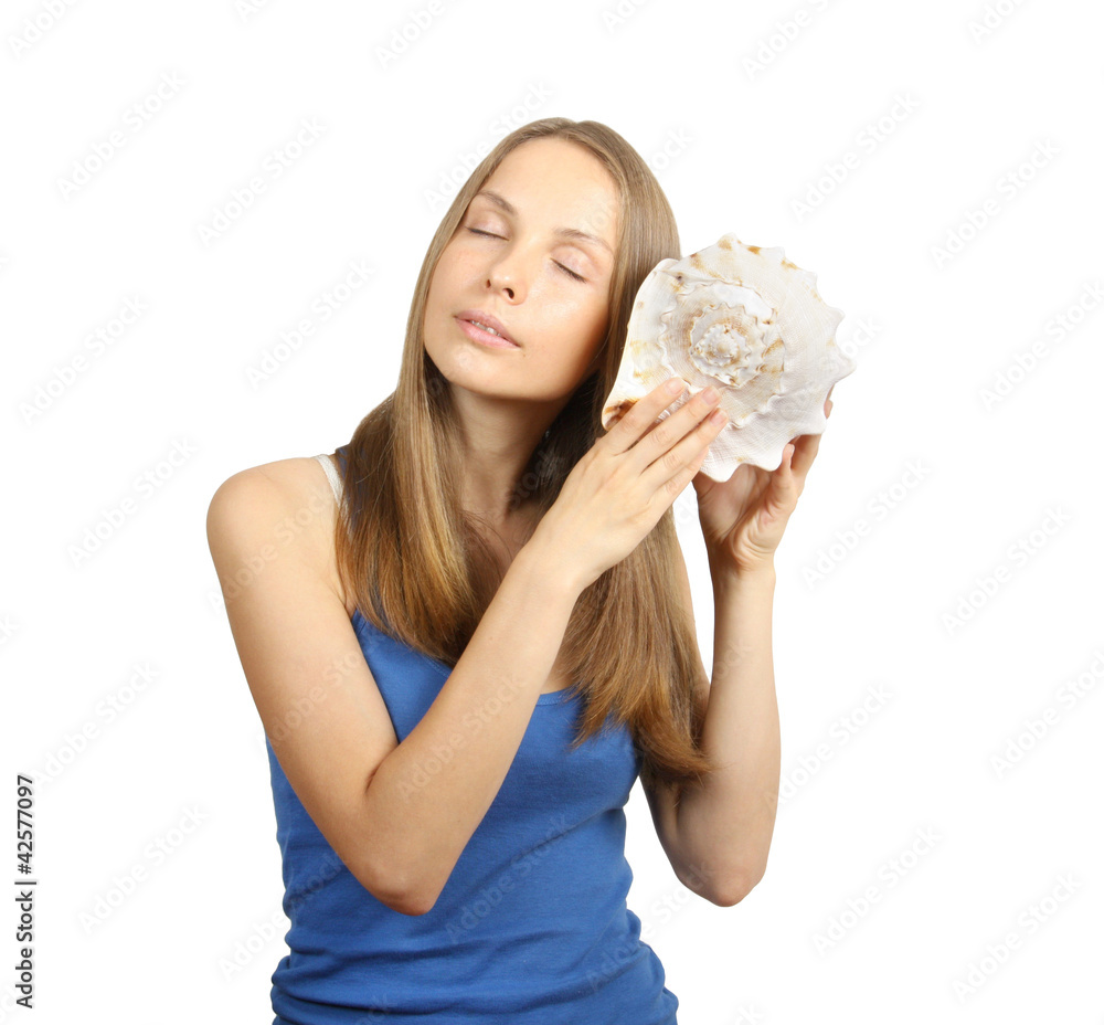 young woman holding a shell, isolated on white young woman holding a shell, isolated on white