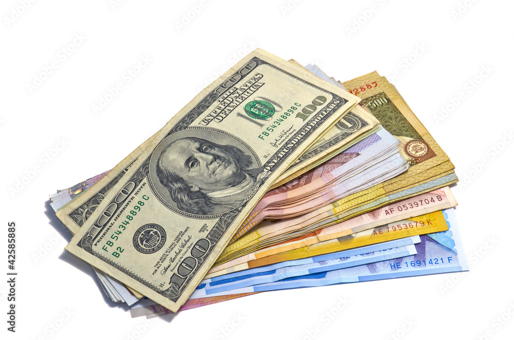big pile of money. stack of many country cash big pile of money. stack of many country cash