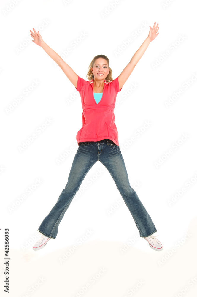 Happy young woman jumping Happy young woman jumping
