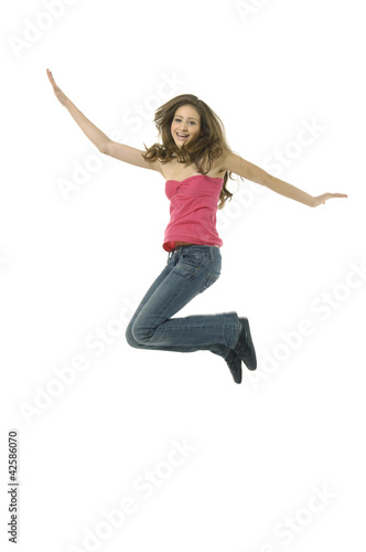 Happy young woman jumping