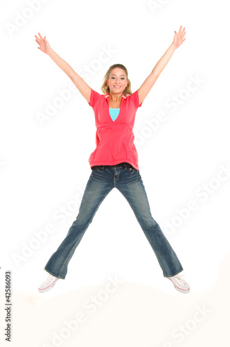 Happy young woman jumping