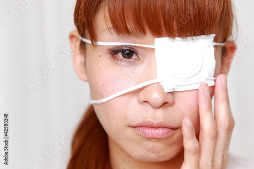 woman with the eyepatch photo