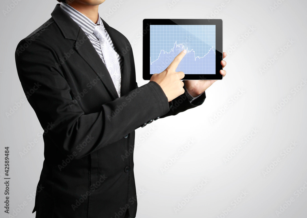 pointing on touch screen tablet in hand pointing on touch screen tablet in hand