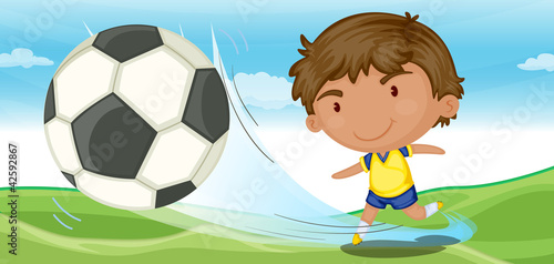 boy playing football