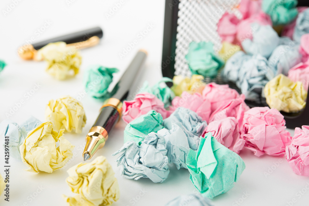 Garbage bin with paper waste with pen Garbage bin with paper waste with pen
