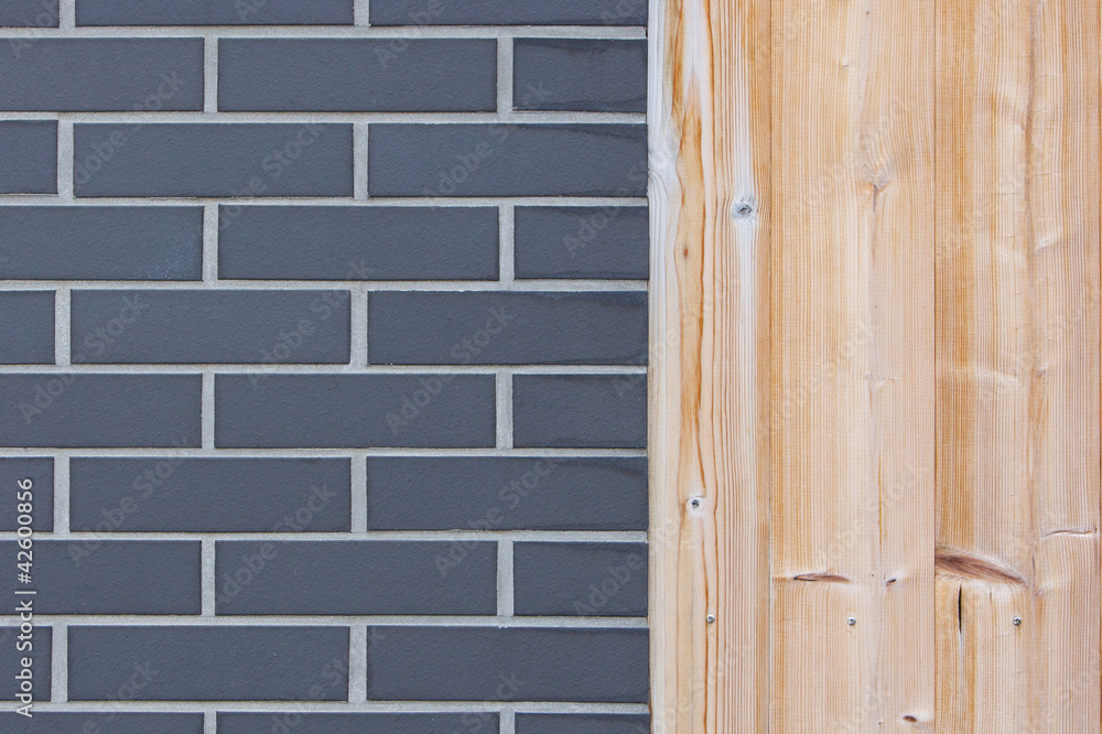 Wall from wood plank and gray brick Wall from wood plank and gray brick
