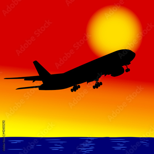 aircraft in flight over the ocean