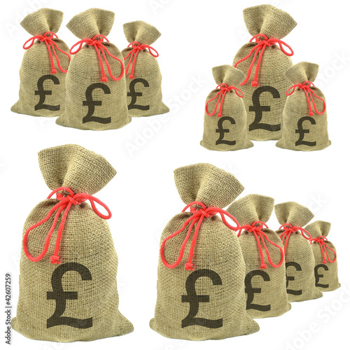Bags of money with Pounds currency on a white background