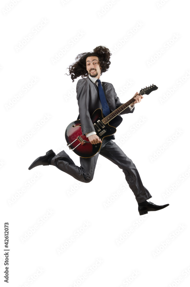 Guitar player in business suit on white Guitar player in business suit on white
