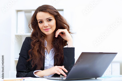 Young busines woman with notebook