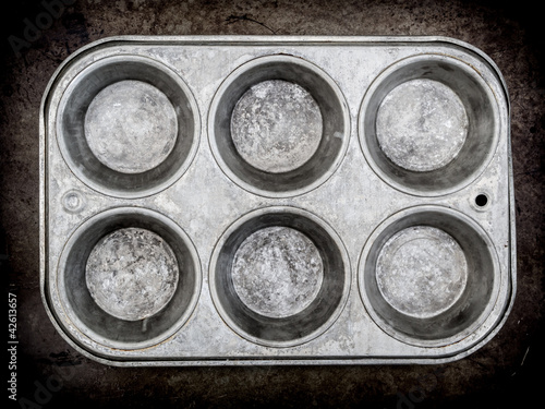 Muffin pan background photo