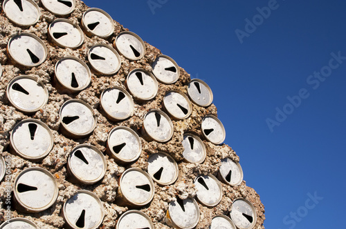 Old beer cans used to build a wall in Lightning Ridge, Australia photo