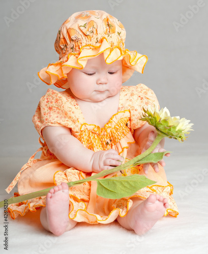 baby in a beautiful dress