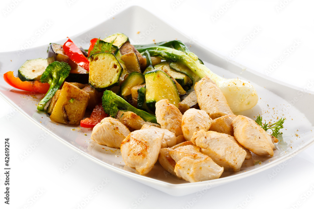 Grilled meat and vegetables on white background Grilled meat and vegetables on white background