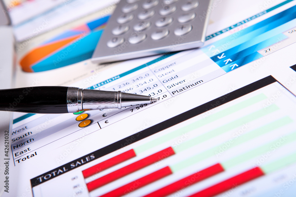 Financial papers on the table Financial papers on the table