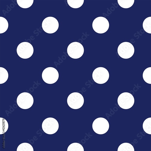 Vector seamless pattern with polka dots on navy blue background