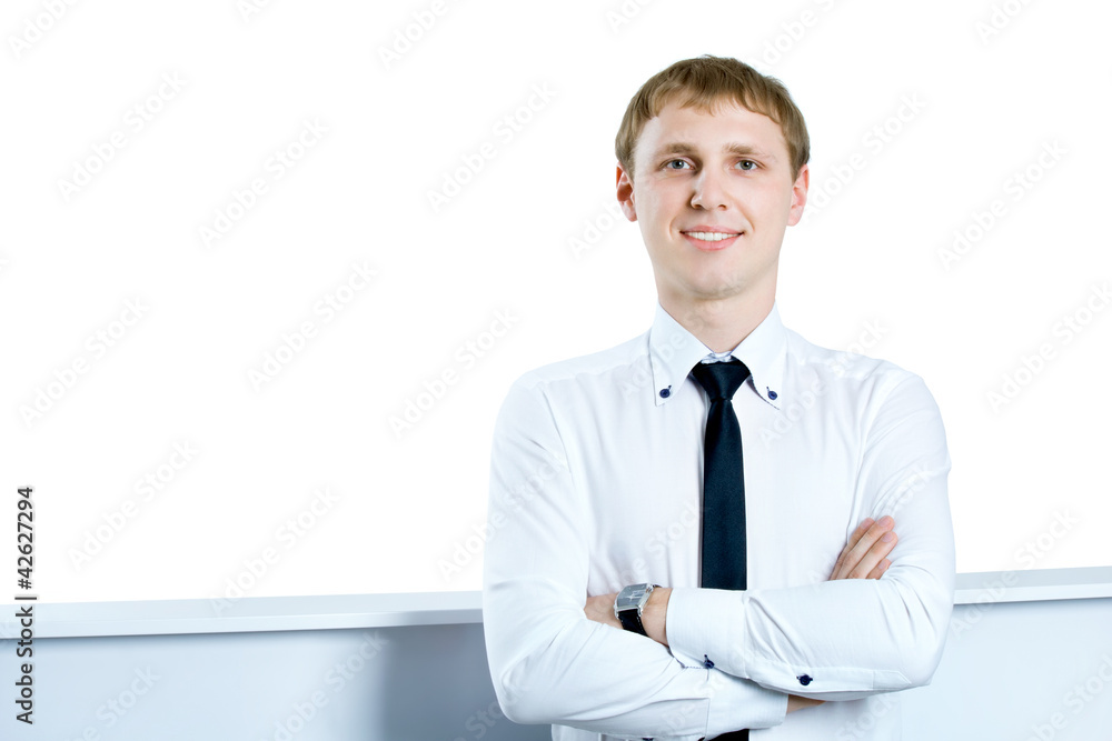 Friendly and smiling businessman looking at camera with reliabil Friendly and smiling businessman looking at camera with reliabil