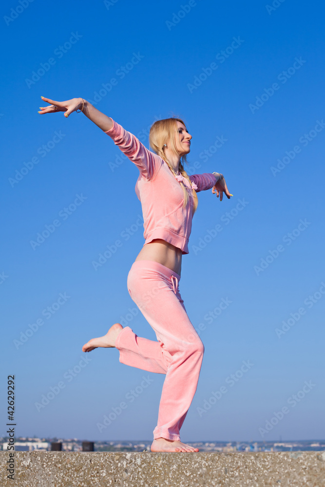 Girl jumpimg outdoors