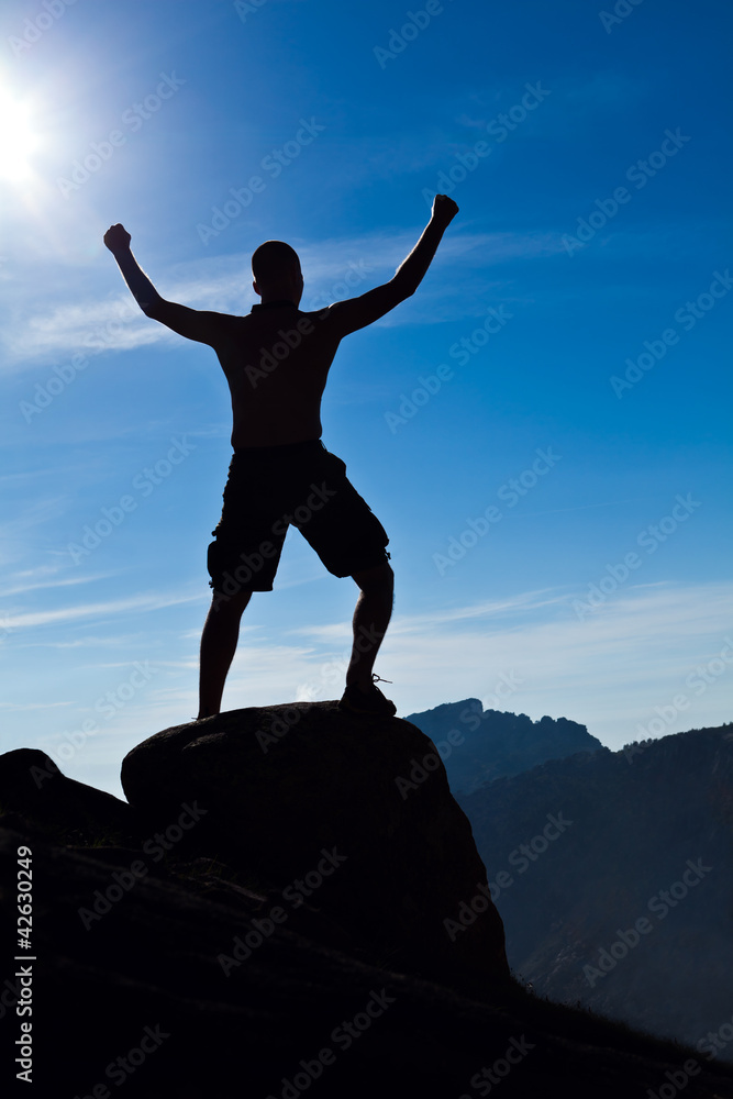 Man climbing in mountains
