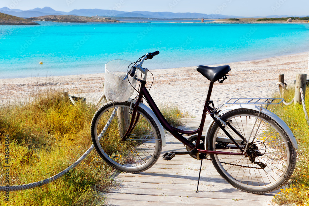 Bicycle in formentera beach on Balearic islands Bicycle in formentera beach on Balearic islands