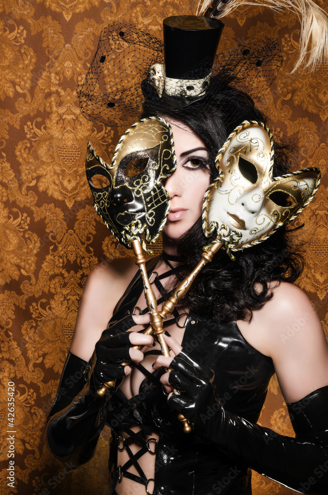 Fototapeta premium Mysterious Masquerade - Sexy Vixen with Venetian Masks