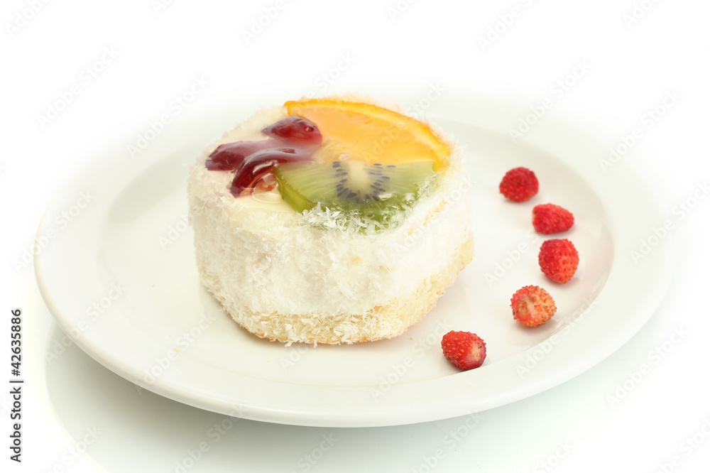 sweet cake with fruits on plate isolated on white