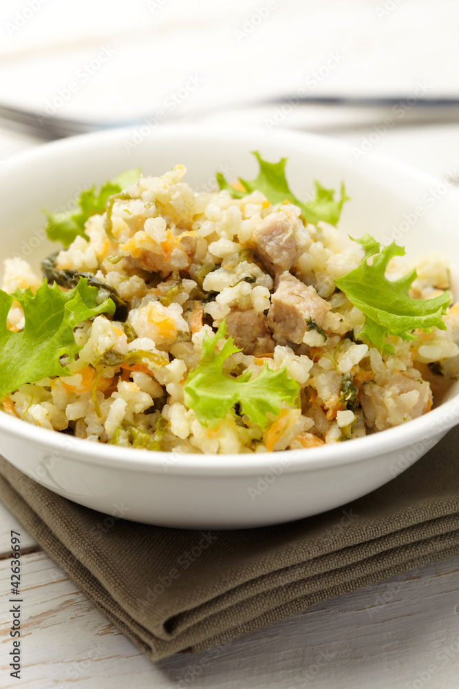Rice with pork, carrots and spinach Rice with pork, carrots and spinach