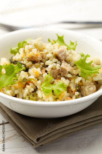 Rice with pork, carrots and spinach